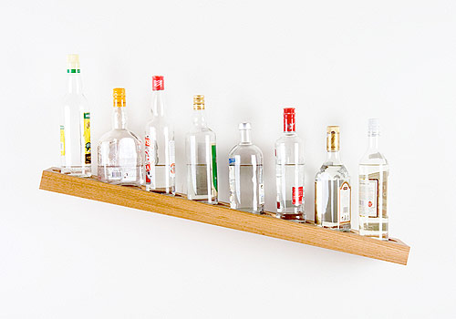 james hopkins artist sculpture tilted shelf bottles