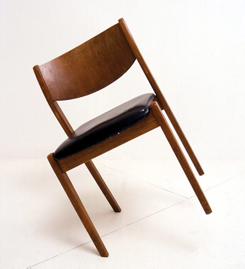 james hopkins artist sculpture slanted chair balance