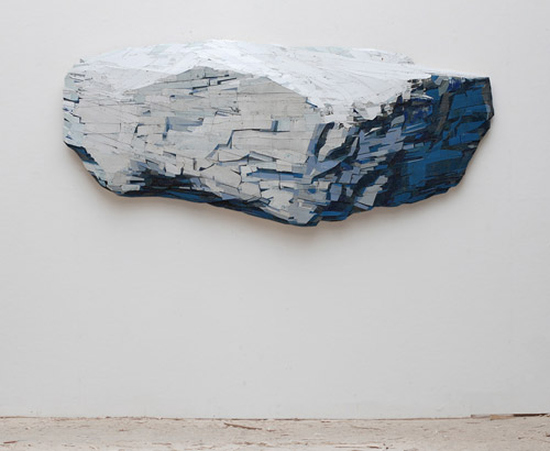Sculptures by artist Ron van der Ende made of found scrap wood