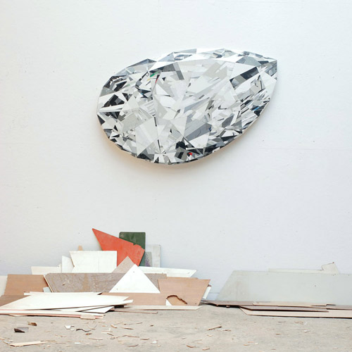 Sculptures by artist Ron van der Ende made of found scrap wood