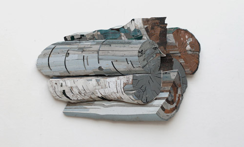 Sculptures by artist Ron van der Ende made of found scrap wood