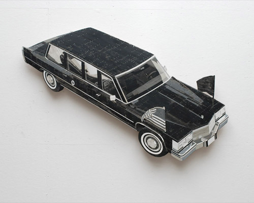 Sculptures by artist Ron van der Ende made of found scrap wood
