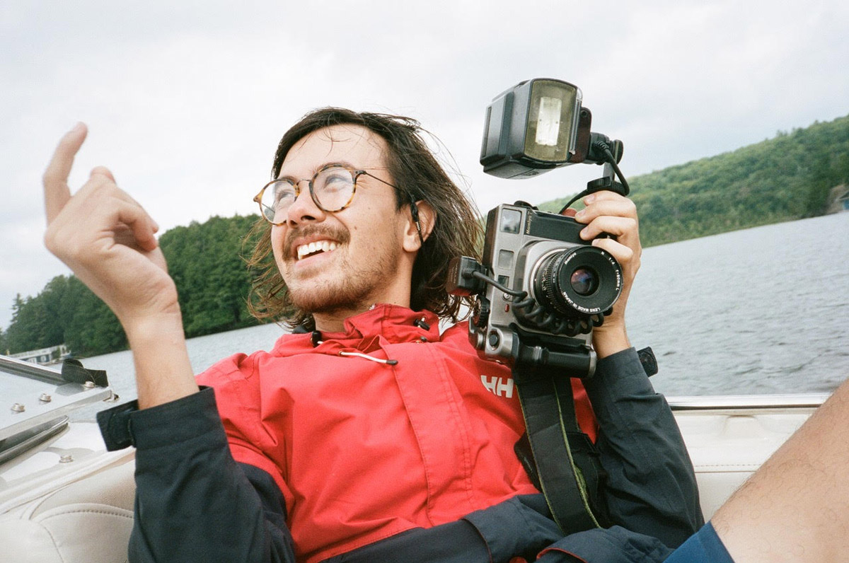 Brendan George Ko and his Mamiya 7 camera - photo by Mark Sommerfeld